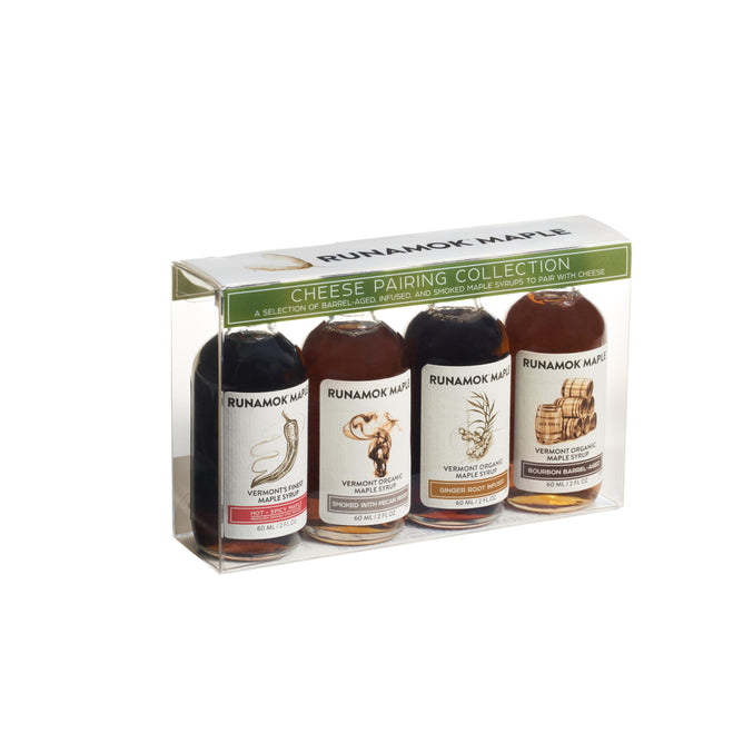 The Runamok Cheese Pairing Collection features four uniquely flavored infused syrups in clear packaging, perfect for pairing with cheese.