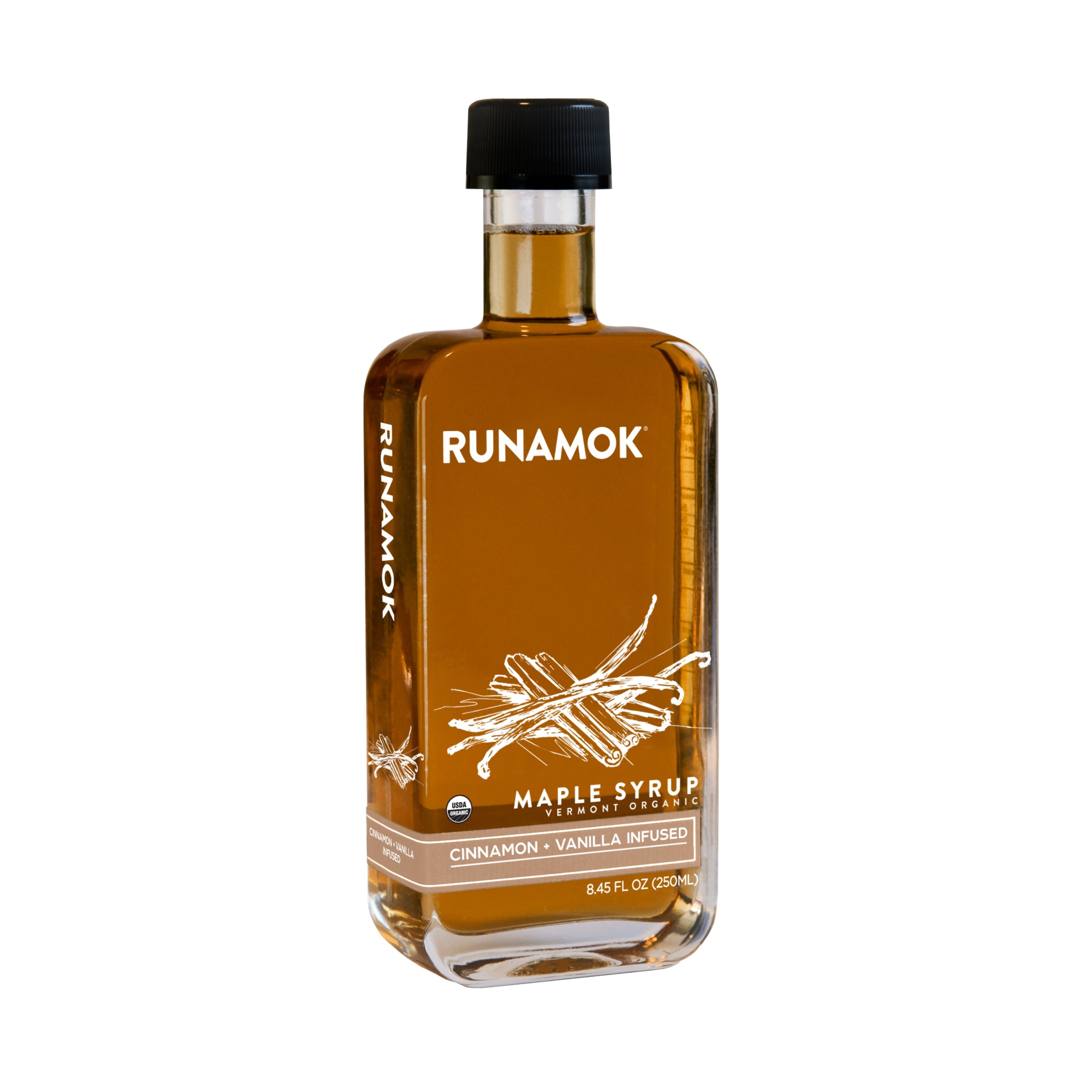 An 8.45 fl oz (250 ml) bottle of Runamok Cinnamon + Vanilla Infused Maple Syrup, with a black cap and a label showing cinnamon sticks and vanilla, offers rich, aromatic flavor.