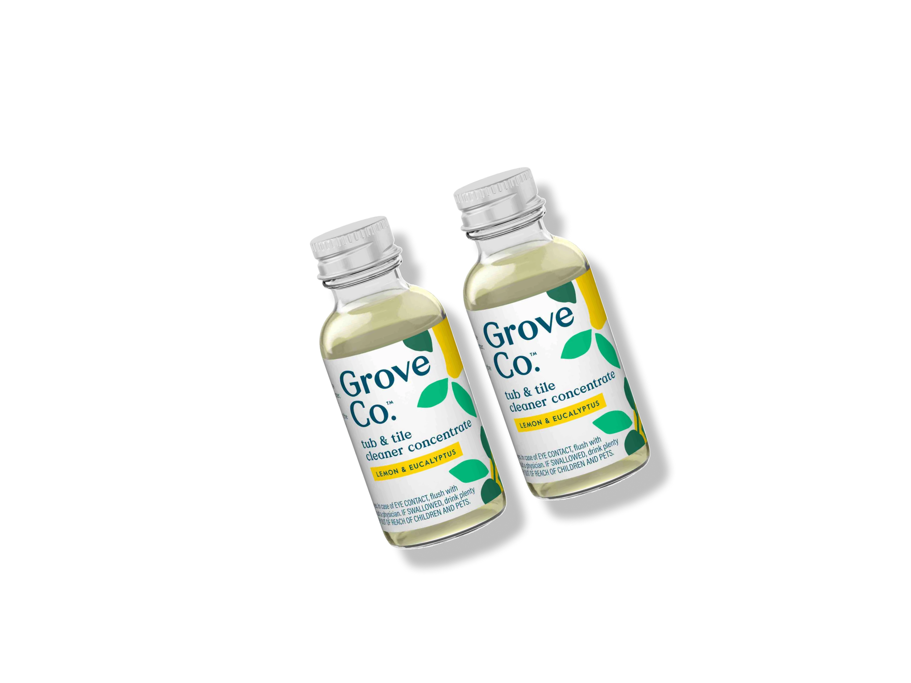 Two clear bottles of Grove Co. Tub & Tile Cleaner Concentrate, Lemon & Eucalyptus scent, with green leaves and yellow accents on the labels, placed against a white background.