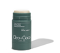 A green stick of Cleo & Coco Extra Strength Deodorant, labeled basil mint, stands open to reveal the light-colored formula with activated charcoal for 24-hour protection.