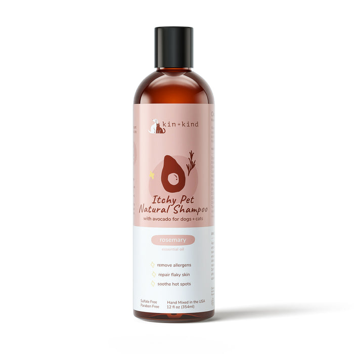 A bottle of kin+kind Itchy Pet Natural Shampoo for dogs and cats, with avocado and rosemary, labeled to remove allergens, repair flaky skin, and soothe hot spots. Bottle size is 12 fl oz (354ml).