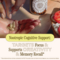 A hand holds three capsules by a bottle labeled Brain Bloom Capsules from Wooden Spoon Herbs and a plate with tomatoes and cheese. Text: Nootropic Cognitive Support—adaptogenic herbal blend for focus, creativity, and memory recall*. FDA disclaimer below.
