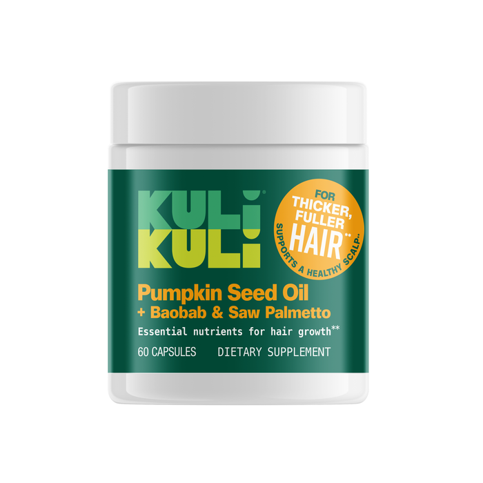 A white bottle of Kuli Kuli Foods Pumpkin Seed Oil Hair Capsules features a green label promoting hair wellness for thicker, fuller hair. The dietary supplement contains 60 capsules.