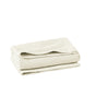 The Coyuchi Oversized Hand Towel from the Air Weight Collection, in cream organic cotton, features a soft, textured surface and sits against a white background, emphasizing its absorbency.