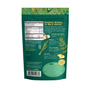 Back of a green Kuli Kuli Foods Crave Reset Superfood Drink Mix package shows supplement facts, ingredients, and info. Illustrations feature moringa, spirulina, and pineapple with benefits like appetite control and GLP-1 support.