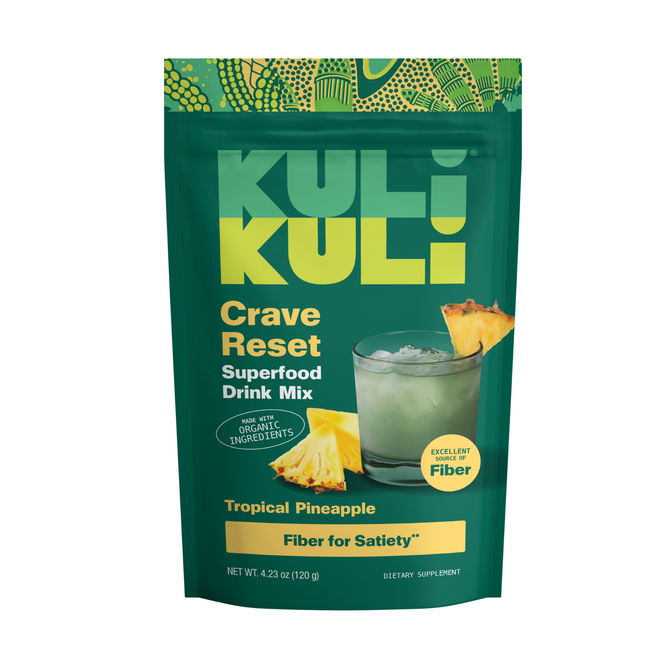 Kuli Kuli Foods’ Crave Reset Superfood Drink Mix in Tropical Pineapple supports appetite control and GLP-1, making it a tasty addition to your wellness routine. The green and yellow pouch shows a drink with ice and pineapple wedges on the front.