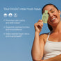 A smiling woman holds a Cymbiotika Liposomal Magnesium Complex Packet - Cognitive + Stress Support near her face against a clear sky, with text highlighting its benefits for calm, sleep, mood, cognitive function, and heart, nerve & muscle health.
