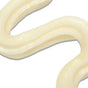 A close-up of Derma E's Vitamin C Whipped Radiance Polish, an off-white, creamy Exfoliating Face Scrub swirled in a wavy line on a white background, resembling lotion or toothpaste.