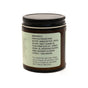 A brown jar with a black lid from Hearth and Homestead displays the Magnesium Body Butter label, listing natural ingredients like shea, mango, and cocoa butter, plus usage and safety instructions for muscle relaxation.