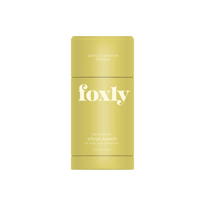 A yellow Foxly Deodorant stick with Gentle & Sensitive Formula, citrus beach, and 24-hour odor protection, 3.0 oz / 85 g, displayed on a white background.
