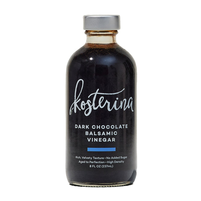 An 8 fl oz (237mL) glass bottle of Kosterina Dark Chocolate Balsamic Vinegar features a rich, velvety texture, no added sugar, and a savory-sweet profile ideal for steak marinades.