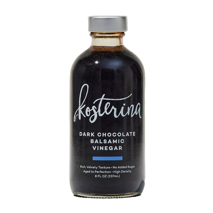 An 8 fl oz (237mL) glass bottle of Kosterina Dark Chocolate Balsamic Vinegar features a rich, velvety texture, no added sugar, and a savory-sweet profile ideal for steak marinades.