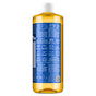 A clear amber bottle with a white cap displays blue and white text that highlights Dr. Bronners Pure-Castile Liquid Soap, its vegan credentials, diverse castile soap uses, usage instructions in English, and small illustrative icons.
