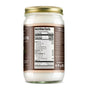 A jar of Dr. Bronners Whole Kernel Virgin Coconut Oil displays its nutrition facts label: 120 calories per tablespoon, 14g total fat, and 0g cholesterol, sodium, carbohydrates, and protein.