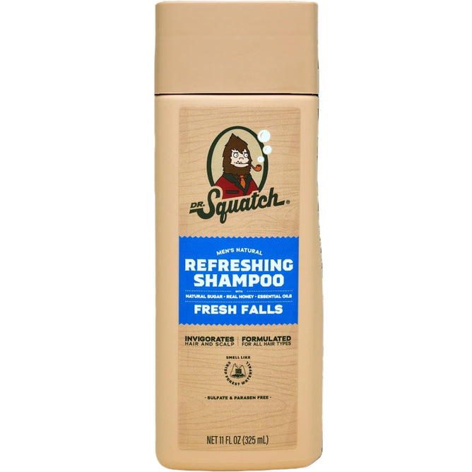 Dr. Squatch Refreshing Shampoo, in a tan bottle labeled Fresh Falls, features jojoba oil and natural scent notes. Its sulfate and paraben-free with essential oils, available in an 11 oz (325 ml) size.