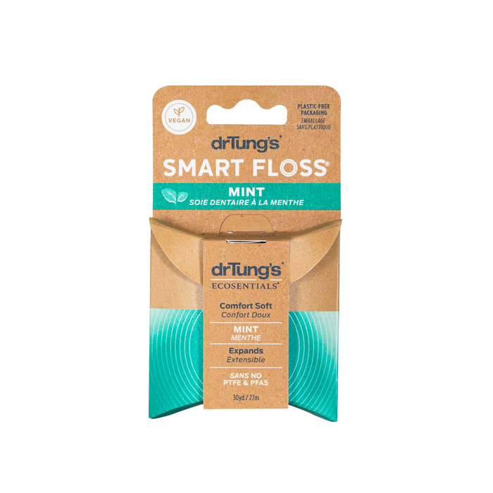 Front view of Dr. Tungs Smart Floss®, a mint-flavored, natural dental floss in a brown eco-friendly box with green accents. Packaging highlights it’s vegan, plastic-free, and expands to clean effectively.
