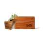 A rectangular wooden block engraved with drift sits beside split wood and green foliage, highlighting the Drift Wood Car Air Freshener Refill—crafted with designer-grade scents and shown on a white background.