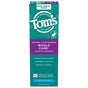 A teal and purple box of Tom's of Maine Whole Care Fluoride Toothpaste in peppermint flavor highlights enamel strengthening, teeth whitening, and cavity prevention.