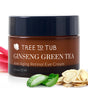 A brown jar labeled Anti-Aging Retinol Eye Cream for Sensitive Skin by Tree To Tub sits beside green aloe, sliced ginseng, and a pink petal, highlighting this hyaluronic acid eye cream on a white background.
