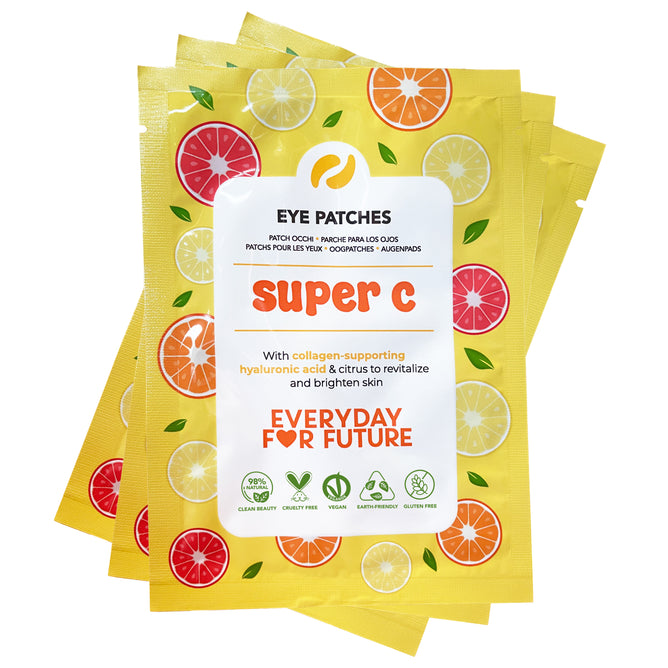 Four yellow packets of Everyday For Future Brightening Super C Eye Patches with Hyaluronic Acid, decorated with colorful citrus fruit designs, highlight their skin-brightening and revitalizing benefits.