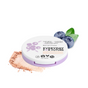 A round compact of Everyday For Future Nourishing Blueberry Infused Highlighter with a purple lid, some spilled powder, and two blueberries with green leaves. The eco-friendly packaging highlights its vegan formula.
