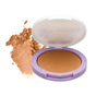 The Everyday For Future Nourishing Blueberry Infused Highlighter, in a compact with a purple rim and white lid, sits beside a smudged swatch—ideal for adding a natural, radiant glow on a white background.