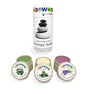 A cylindrical Elseware Unplug Therapy Dough Sampler with Aromatherapy is shown beside three small open jars—green (peppermint), cream (eucalyptus), and purple (lavender)—for a relaxing sensory experience.