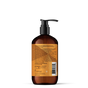 Everyone Hand Soap comes in an amber plastic pump bottle with an orange label displaying ingredients and product information on the back, set against a plain white background. This limited edition offering features unique essential oil blends inspired by festive holiday scents.