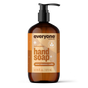 A 12.75 fl. oz. pump bottle of Everyone Hand Soap, a limited edition with a sweet cinnamon and vanilla scent inspired by holiday fragrances, crafted with essential oil blends. The orange label features white and brown text, small stars, and a leaf icon.