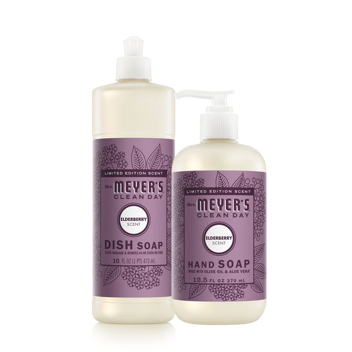 The Mrs. Meyer's Fall Hand & Dish Soap Set includes a 16 fl oz dish soap with a flip cap and a 12.5 fl oz pump hand soap, both with purple elderberry-themed labels and delightful fall scents.
