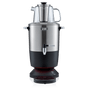 The SAKI Electric Samovar, featuring a sleek stainless steel design with a glass teapot on top, front spout, and a black base with a red-lit drip tray, offers an efficient keep warm function to maintain your tea at the perfect temperature. Shown on a white background.