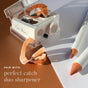 A white dual sharpener with wood shavings next to two sharpened Ere Perez Jojoba Eye Pencils on a white surface. Text: Pair with Perfect Catch Duo Sharpener—ideal for sensitive eyes, enriched with jojoba.