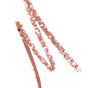 Two thick, uneven, brownish-pink lines appear on a white background—one straight, the other diagonally curved—resembling strokes from the Ere Perez Acai Lip Pencil.