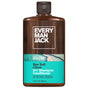 A 13.5 fl oz bottle of Every Man Jack 2-in-1 Shampoo and Conditioner for Men, featuring a wood-patterned label with teal accents and ocean imagery, made with clean ingredients and cruelty-free.