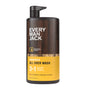 A bottle of Every Man Jack 3-in-1 All Over Wash with a brown wood-patterned label and yellow accents. Made with coconut-derived surfactants, this wash is paraben-, phthalate-, and dye-free.