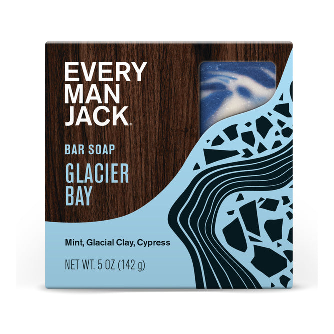 Every Man Jack Cold Plunge Bar Soap in Glacier Bay scent blends mint, eucalyptus, glacial clay, and cypress. The 5 oz (142 g) bar comes in a box with wood and blue glacier graphics featuring a swirl design.