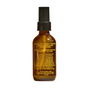 A brown glass spray bottle with a black cap, labeled in yellow as Everyday Oil, Early Morning Blend for face, body, and hair; it highlights botanical oils, organic skincare benefits, and the Everyday Oil brand.