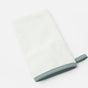 A white, rectangular washcloth with soft texture and light blue trim, featuring a small loop for hanging, is shown on a plain white background—crafted to complement your organic baby hooded towel or serve as the perfect baby bath mitt for gentle cleansing.