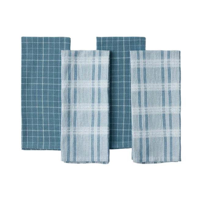 Four blue and white plaid napkins from the Coyuchi Clarendon Organic Kitchen Towels set are arranged in two patterns—two feature thin white lines while the other two have wider white plaid stripes—displayed on a white background. Made from GOTS certified organic cotton, these Coyuchi towels combine style and sustainability for your table setting.