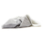 A crumpled Tidy Dish Cloth from Full Circle, featuring white mesh with a textured scrubbing surface, is shown on a white background.