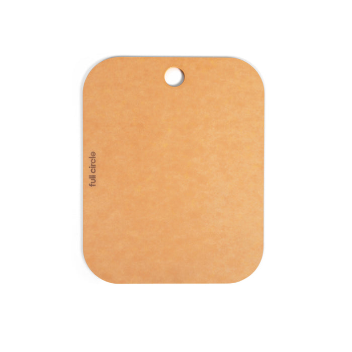 A rectangular tan-colored board with rounded corners, a small hole near the top center, and the words full circle written vertically on the left side. The board is placed against a white background.