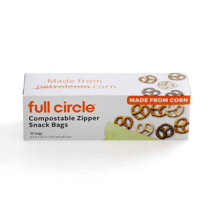 A box of Full Circle Compostable Zipper Snack Bags with pretzel and green bag images contains 50 freezer-safe, corn-based bags (not petroleum) measuring 6.5 x 3.2 inches.
