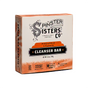 A box of Spinster Sisters Co. Vegan Daily Glow Face Cleanser Bar – Pineapple and Papaya for acne-prone skin, featuring eco-friendly icons, women-owned and plastic-negative certifications, plus a Peace Out Plastic message on the side.
