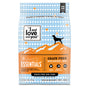 A bag of I and Love and You Naked Essentials Grain-Free Chicken and Duck Recipe Dry Dog Food, featuring orange/blue packaging with a dog silhouette on mountain peaks, plus Omega 3 & 6 fatty acids listed on the front.