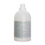 A bottle of Rebel Green Fresh Laundry Detergent Liquid - 3x Concentrated features a white cap, mostly white label, and highlights gentle, sulfate-free, low-sudsing, vegan ingredients. The back label displays detailed product information.