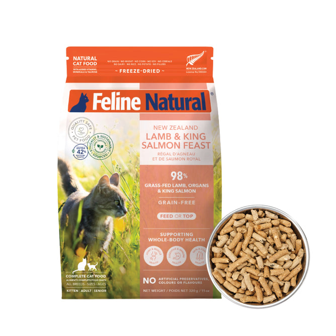 A bag of Feline Natural Grain-Free, Freeze-Dried Cat Food sits next to a bowl of the meal. The Feline Natural packaging features a cat, scenic New Zealand imagery, and product information.
