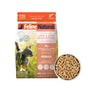 A bag of Feline Natural Grain-Free, Freeze-Dried Cat Food sits next to a bowl of the meal. The Feline Natural packaging features a cat, scenic New Zealand imagery, and product information.