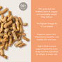 A close-up of Feline Natural Grain-Free, Freeze-Dried Cat Food on the left, with text on the right highlighting 98% real meat, grass-fed lamb and organs, king salmon, high omega-3s, anti-inflammatory benefits, and DHA for brain health.