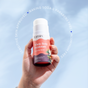 A hand holds a Fomin Deodorant Stick against a blue sky. Text circles the image: Sensitive skin approved, free of baking soda, parabens & aluminum—Fomin is an eco-conscious choice for effective odor neutralization.