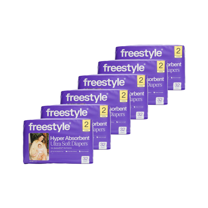 Five packs of Freestyle Tree Free Bamboo Diaper - One Month Supply, size 2, 32 ultra soft eco-friendly bamboo diapers each, aligned diagonally on a white background.